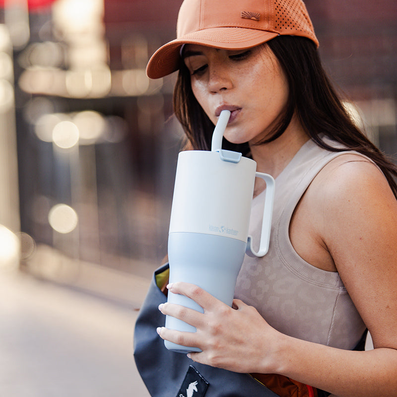 36oz-rise-tumbler-with-straw-lid-i8 36oz_rise_tumbler_straw_girl_sip_square.jpg