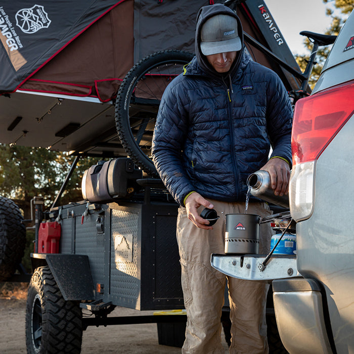 64oz-wide-with-loop-cap-a8 64oz_wide_mouth_bottle_camping_pour_square.jpg