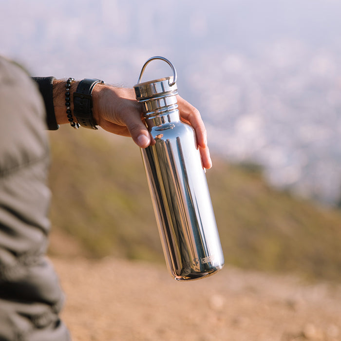 27oz-reflect-with-bamboo-cap-e1 K27SSLRF-MS-BAMBOO_reflect_bottle_hand_lifestyle.jpg
