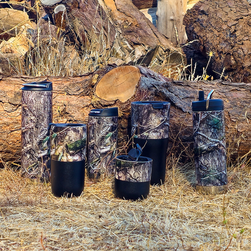 12oz-tkwide-with-cafe-cap-mossy-oak-z1 MossyOak_CountryDNA_collection_grass_logs_square.jpg