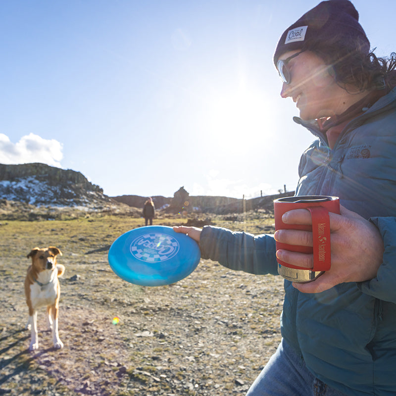 12oz-camp-mug-c3 insulated_camp_mug_12oz_woman_dog_frisbee_square.jpg
