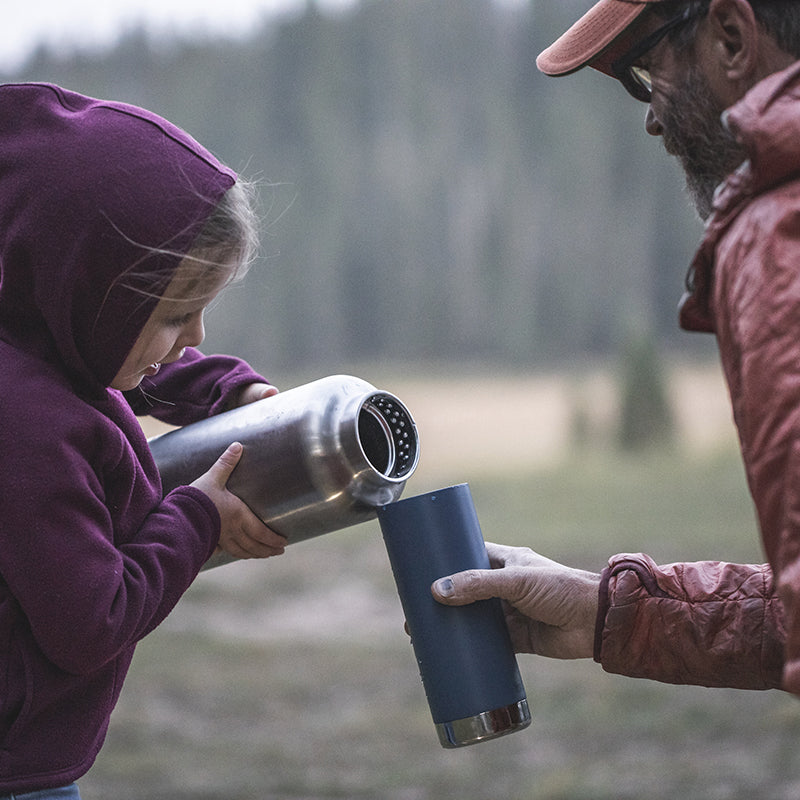 64oz-tkwide-with-loop-cap-y2 tkwide_64oz_bottle_girl_dad_filling_square.jpg